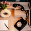 Retro Phone Lamp on vintage white desk.