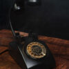 Retro Phone Lamp on a vintage dark wooden desk.