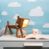 Dog lamp on a white shelf.