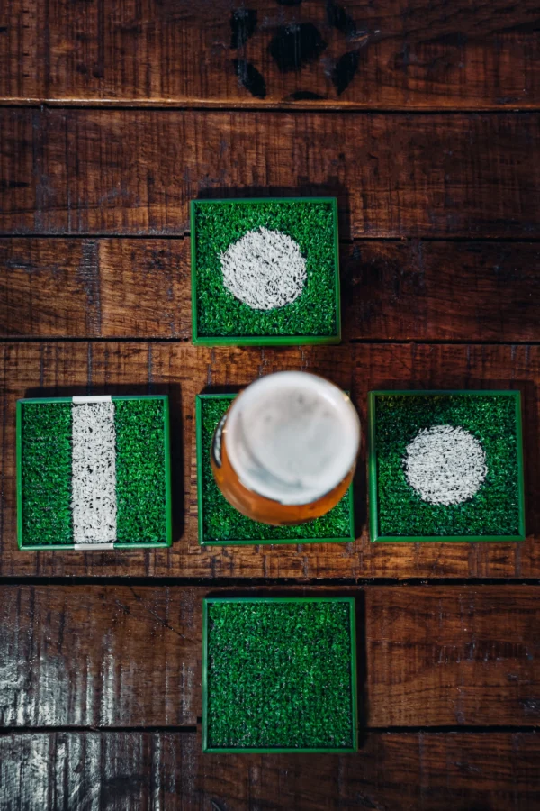 Five football cup coasters - shot from above.